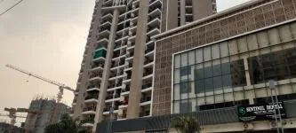 Ace Divino Sector 1 Greater Noida West completed residential towers seen from the entrance road