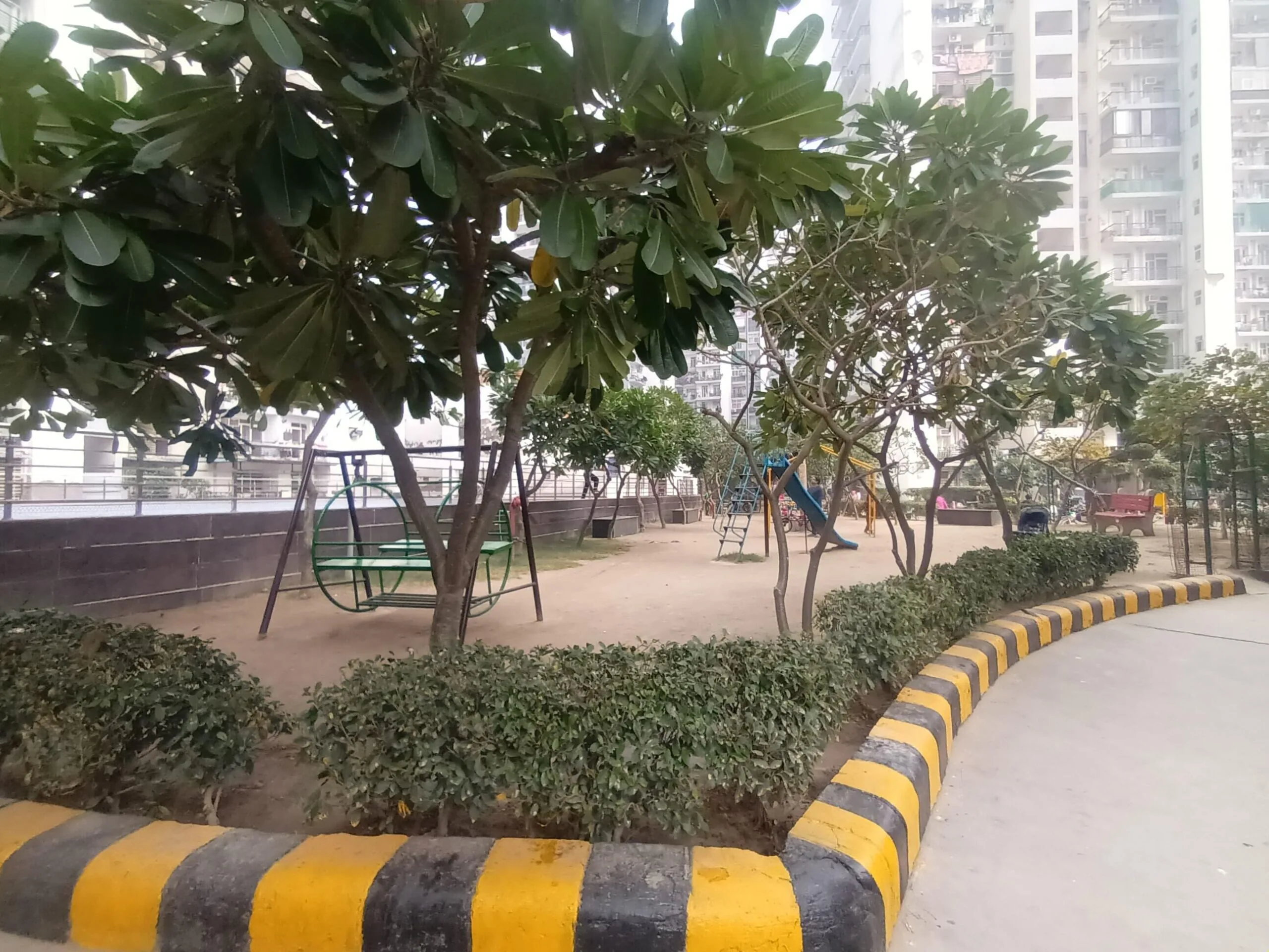 Gardenia Glory Sector 46 Noida towers viewed from the central landscaped garden